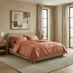 Luxe copper bedding brings warmth and elegance to a neutral-toned bedroom