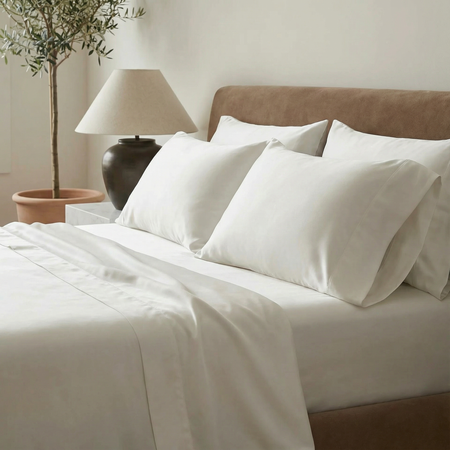 Minimal bedroom featuring cloud-white bamboo pillowcases