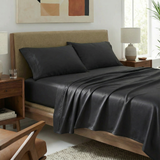 Wrap your dreams in elegance with this silky black sateen pillowcase.