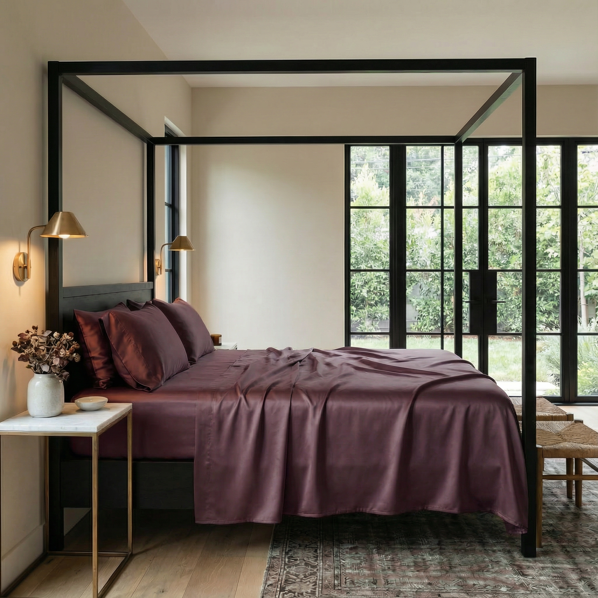 Elegant contemporary bedroom styled with smooth bamboo bedding in a deep fig tone