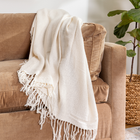 Lightweight bamboo herringbone throw blanket in Natural.